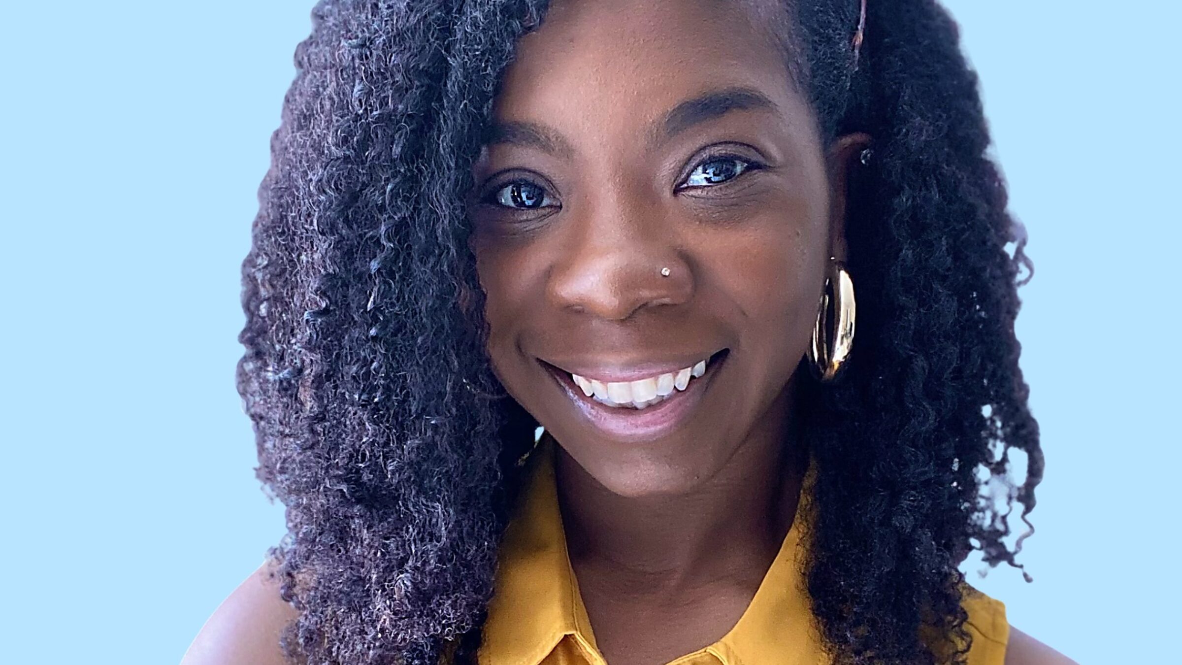 A headshot of Trinity Burke, Admissions Counselor at Merit America.