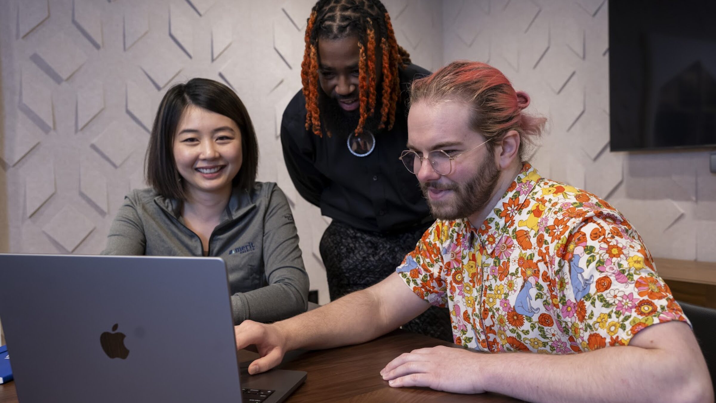 A photo of 3 members of the Merit America community.