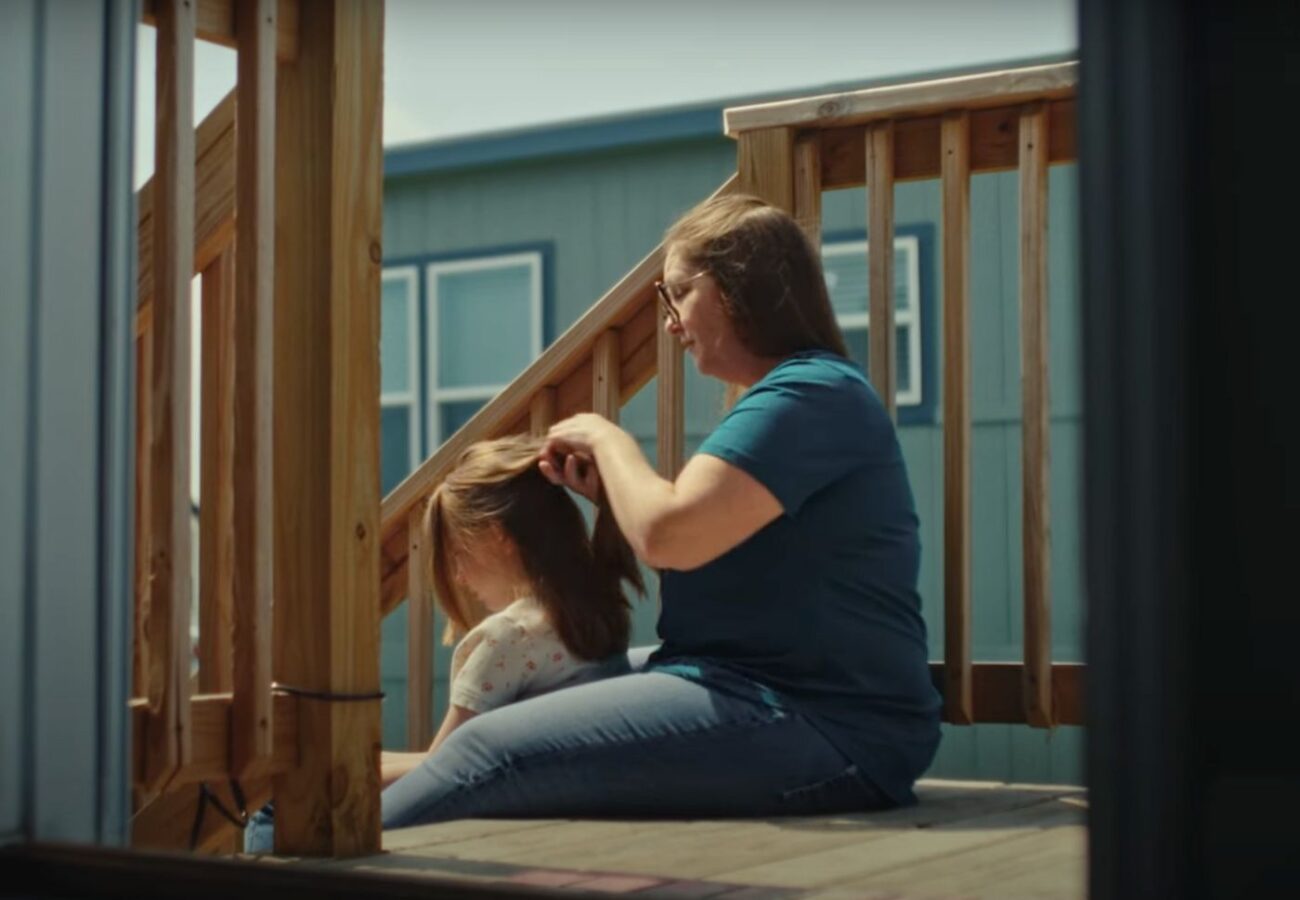 A value prop block showcasing Amy Laird with her daughter.
