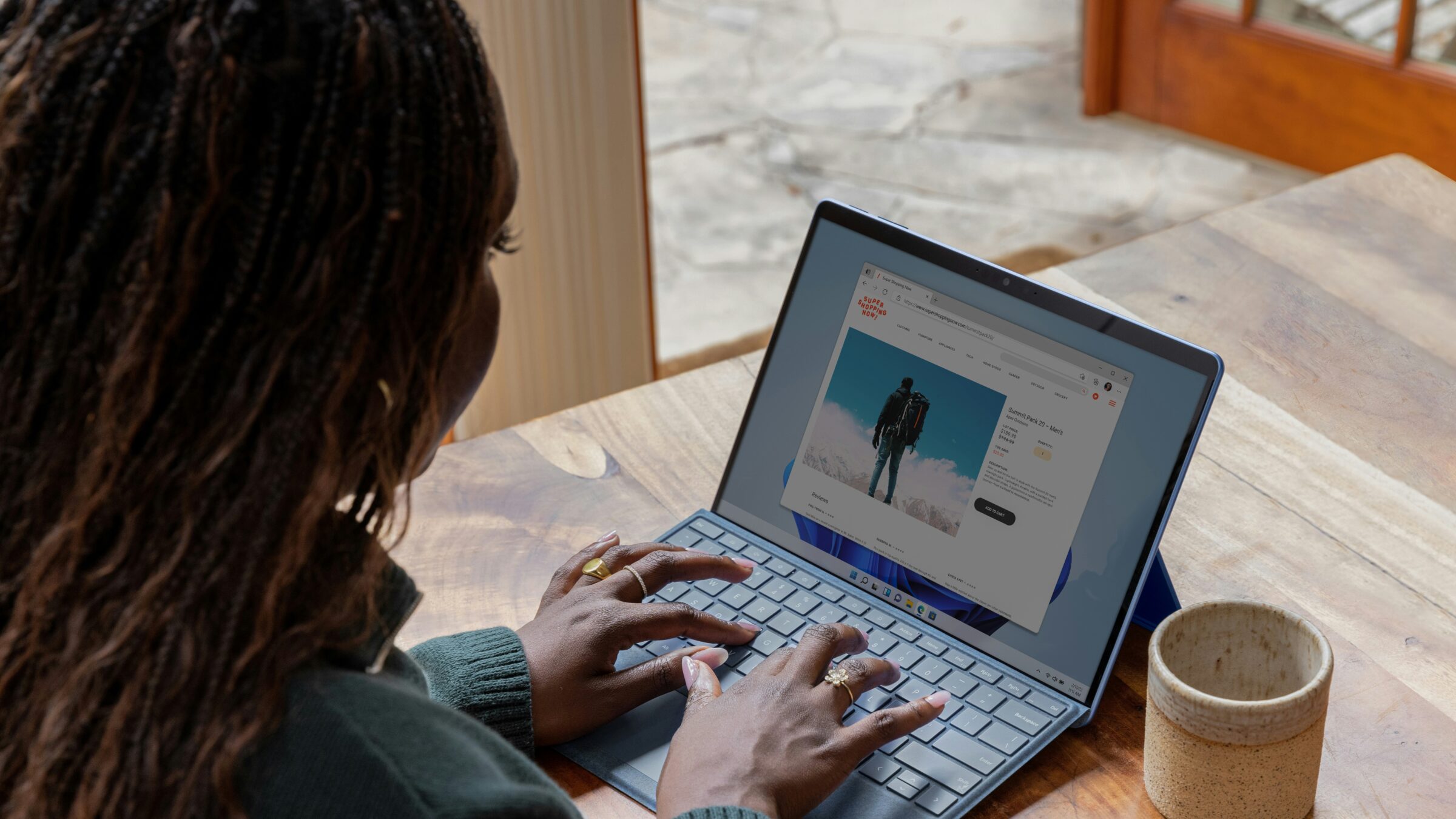 A photo of a person working on a laptop