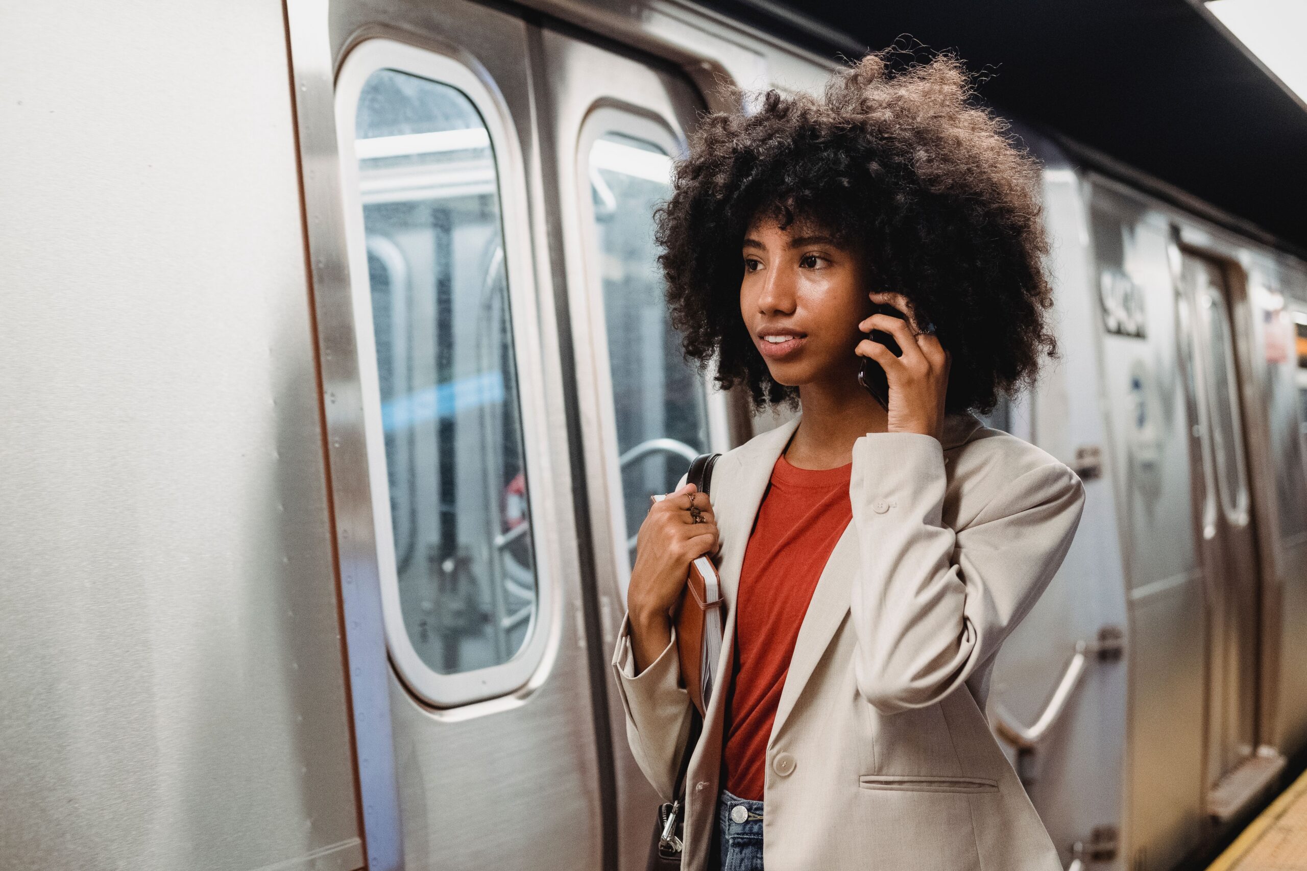 A commuter getting on train to work.